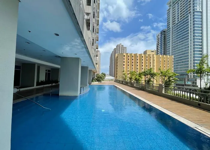 Apartment 1br Family Staycation With 2 Queen Size Bed In Near Robinsons Place Mall And Slmec *